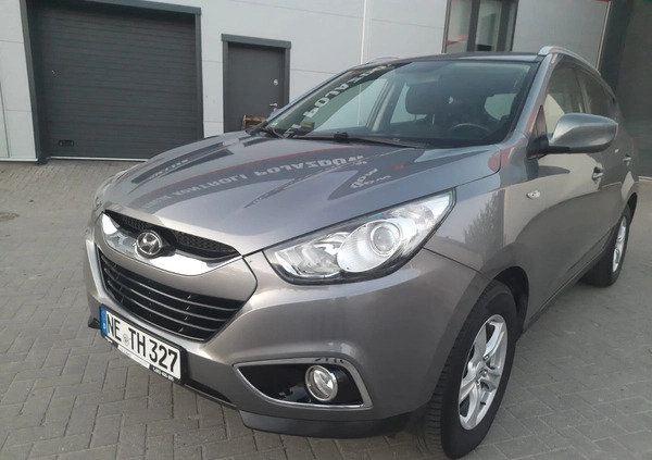 Hyundai Tucson cena 38500 przebieg: 155475, rok produkcji 2012 z Mrągowo małe 301